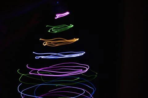 Multicolored circular lights on a black background Stock Photos