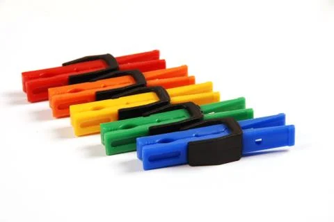 Multicolored clothes pegs Stock Photos