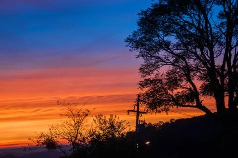 Multicolored clouds and sky at sunset Stock Photos