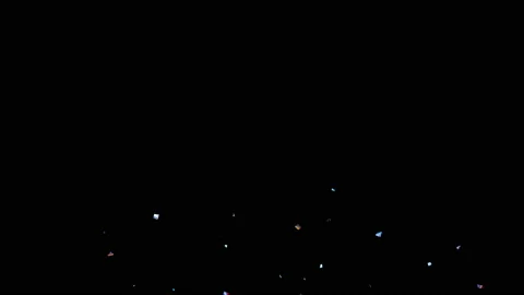 Multicolored confetti exploding on the sides of the screen in 4K with Alpha Stock Footage 154032074