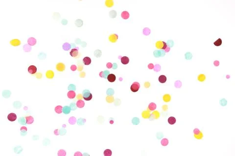 Multicolored confetti on white Stock Photos