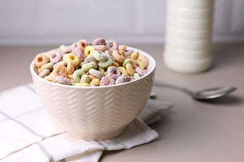 Multicolored corn rings for breakfast on a colored background Stock Photos