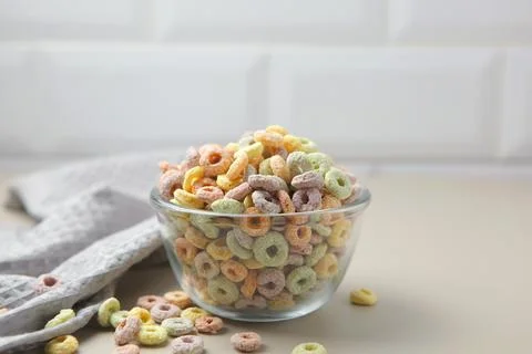 Multicolored corn rings for breakfast on the table Stock Photos