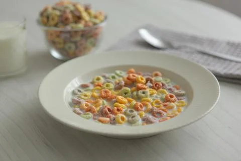 Multicolored corn rings for breakfast on the table Stock Photos