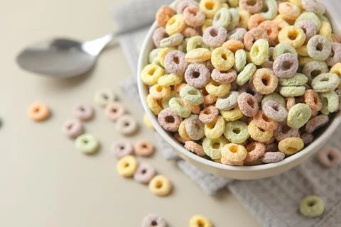 Multicolored corn rings for breakfast on the table Stock Photos