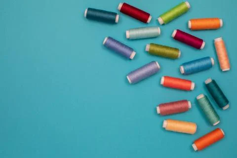 Multicolored cotton threads, spools, handmade sewing. Top view with copyspace Stock Photos