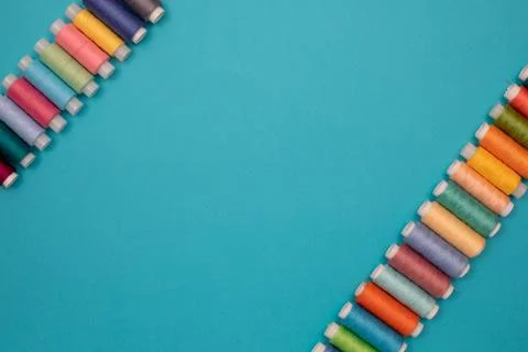 Multicolored cotton threads, spools, handmade sewing. Top view with copyspace Stock Photos