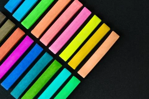 Multicolored crayons Stock Photos