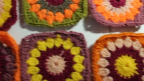 Multicolored crochet granny squares Stock Footage 316636234