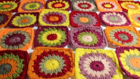 Multicolored crochet granny squares Stock Footage 316636236