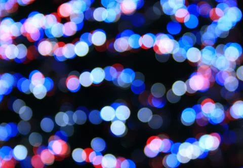 Multicolored defocused bokeh lights background Stock Photos