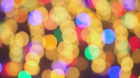 Multicolored defocused light rays creating an atmosphere of magical celebration Video stock 247471854