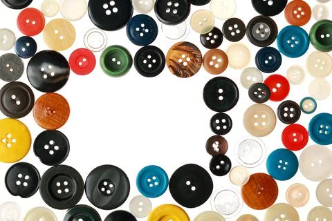 Multicolored different size buttons for clothes. Stock Photos