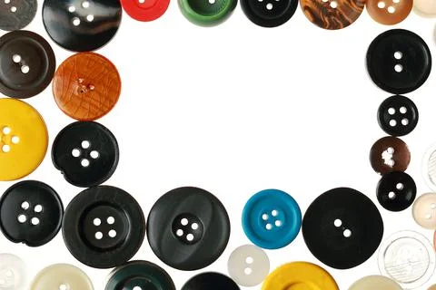 Multicolored different size buttons for clothes. Stock Photos