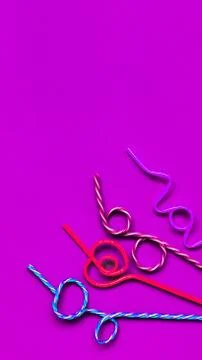 Multicolored Drinking Straws In A Festive Pattern Foto stock