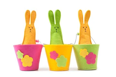 Multicolored easter bunnies sitting in row 스톡 사진