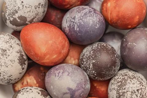 Multicolored easter eggs close up, brightly colored chicken eggs for easter,  Foto stock