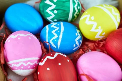 Multicolored Easter eggs, close-up. Happy Easter concept. Stock Photos