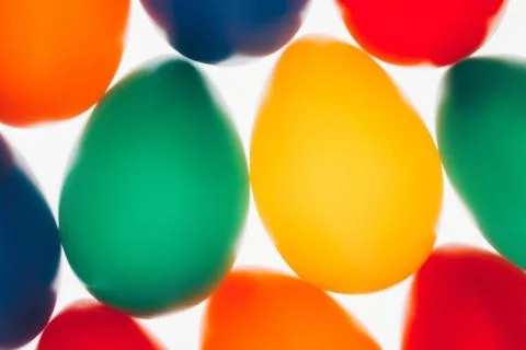 Multicolored Easter eggs in a row Stock Photos