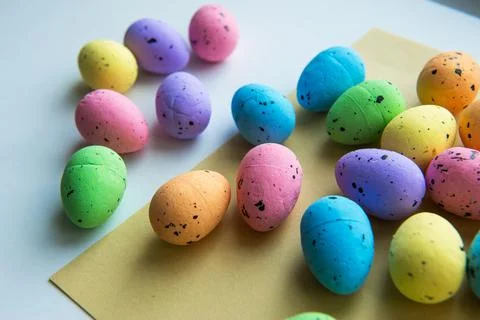 Multicolored Easter eggs on a white background. Decorative easter eggs. Happy Stock Photos
