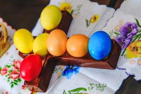 Multicolored eggs decorated for Easter holiday. Row of colorful Easter eggs o Stock Photos