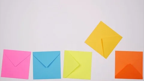 Multicolored envelopes fall from top to bottom. Stop motion Stock Footage 102625623