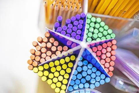 Multicolored erasers on pencils, top view. Back to school Stock Photos