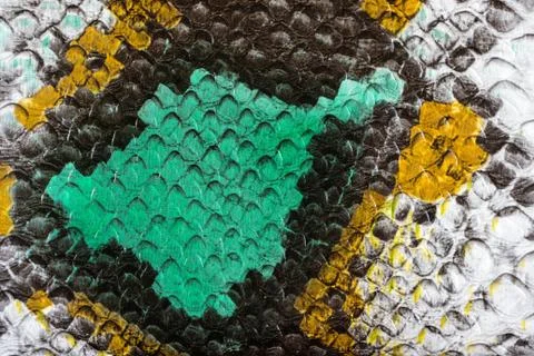 Multicolored faux leather snake Python texture for background. Close up Photos