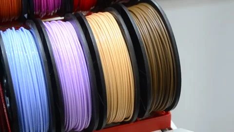 Multicolored filaments of plastic for printing on a 3D printer close-up Stock Footage 146528902