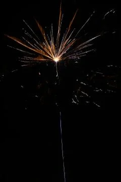 Multicolored fireworks exploding on the sky for New Year Celebration Stock Photos