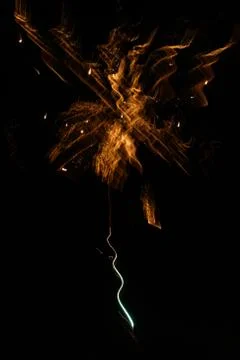 Multicolored fireworks exploding on the sky for New Year Celebration Stock Photos