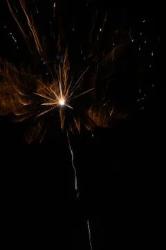 Multicolored fireworks exploding on the sky for New Year Celebration Stock Photos