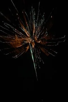 Multicolored fireworks exploding on the sky for New Year Celebration Stock Photos