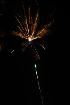 Multicolored fireworks exploding on the sky for New Year Celebration Stock Photos