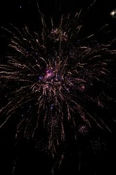 Multicolored fireworks exploding on the sky for New Year Celebration Stock Photos