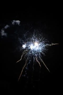 Multicolored fireworks exploding on the sky for New Year Celebration Stock Photos
