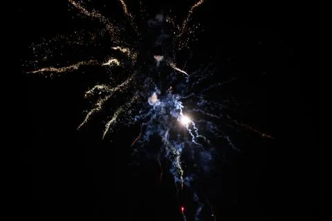 Multicolored fireworks exploding on the sky for New Year Celebration Stock Photos