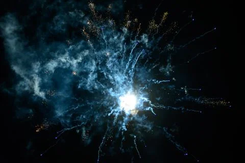Multicolored fireworks exploding on the sky for New Year Celebration Stock Photos