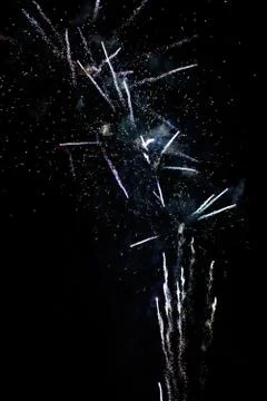 Multicolored fireworks exploding on the sky for New Year Celebration Stock Photos