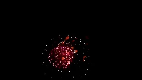Multicolored fireworks exploding with smoke in dark night sky Stock Footage 329674155