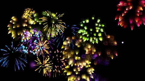 Multicolored fireworks flashes in the sky at night during New Year or holiday Stock Footage 321653270