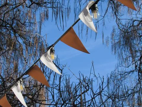 Multicolored flags against the blue sky Foto stock
