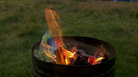 Multicolored Flames in Outdoor Fire Pit Stock Footage 320249000