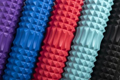 Multicolored foam massage rollers. Close up. Equipment for myofascial release 스톡 사진