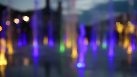 Multicolored fountain, bokeh, out of focus Stock Footage