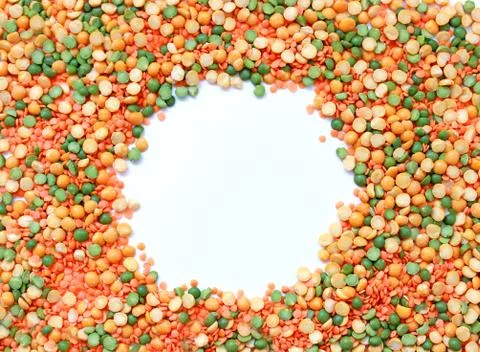 Multicolored frame of mixture of peas and lentils Stock Photos