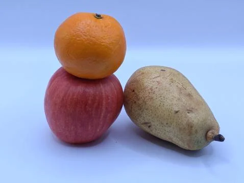 Multicolored fruits composition on a light background Stock Photos