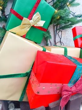 Multicolored gift boxes with ribbons. Outside. Stock Photos
