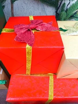 Multicolored gift boxes with ribbons. Outside. Stock Photos