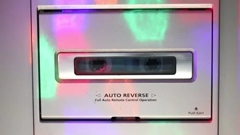 Multicolored glare on a cassette player playing music Stock Footage 163040352